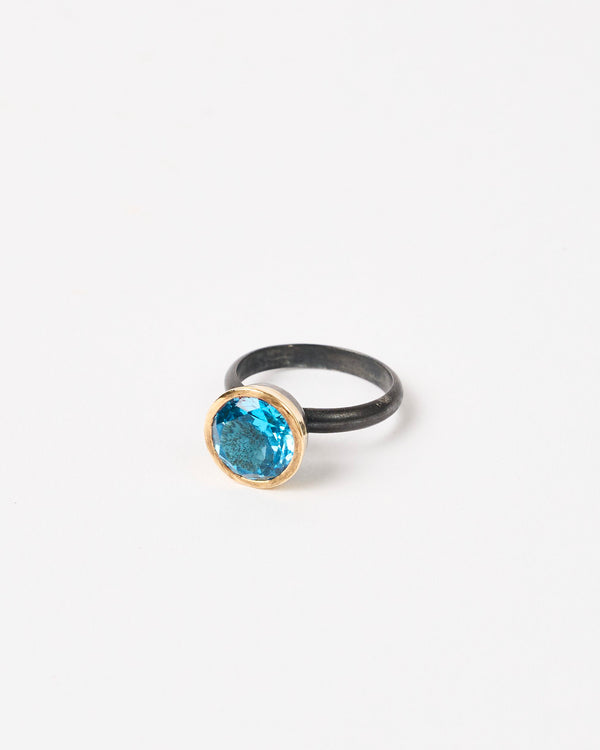 Shimara Carlow— Mid Blue Topaz set in 18ct Gold and Oxidised Sterling Silver Ring