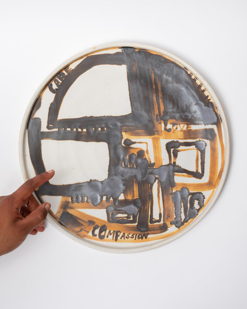 Em Frank — 'Compassion' Iron Oxide Painted Plate