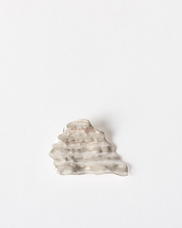 Emily O'Brien – 'Chip on the Shoulder', Small Brooch in Silver