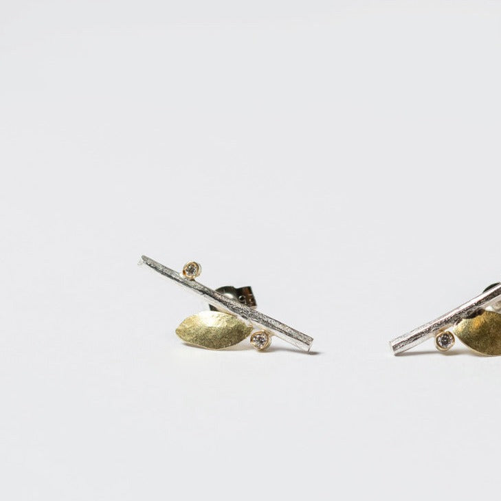 Shimara Carlow— Leaf Stud Earrings in Sterling Silver and Gold with White Diamonds