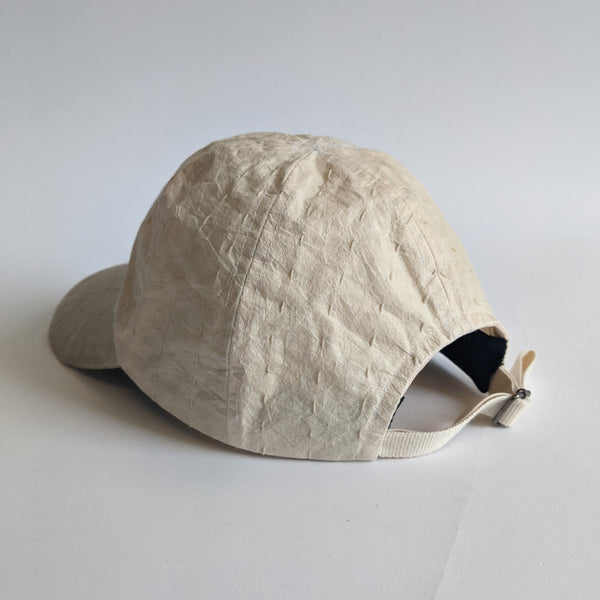 DNJ — Waxed Japanese Paper Leather Cap in Cream